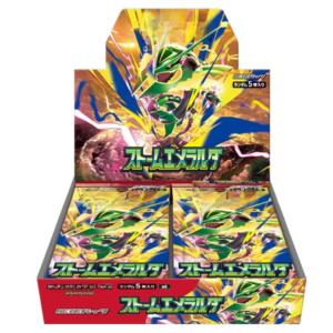 Boîtes d’énergisation Storm Emeralda M6 ouvertes, affichant les cartes brillantes et Rayquaza en feux, avec le motif émeraude et le texte japonais. Storm Emeralda M6, le guide complet intégré.