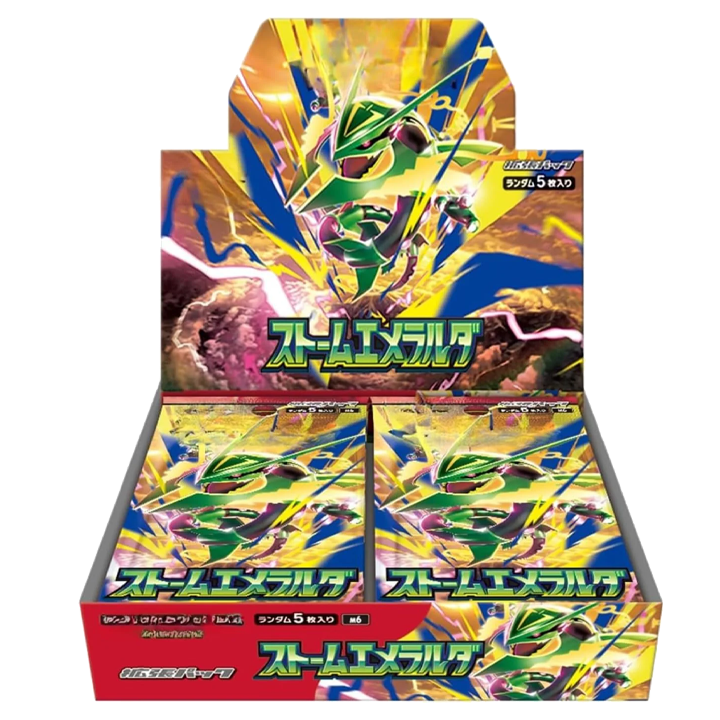 Boîtes d’énergisation Storm Emeralda M6 ouvertes, affichant les cartes brillantes et Rayquaza en feux, avec le motif émeraude et le texte japonais. Storm Emeralda M6, le guide complet intégré.